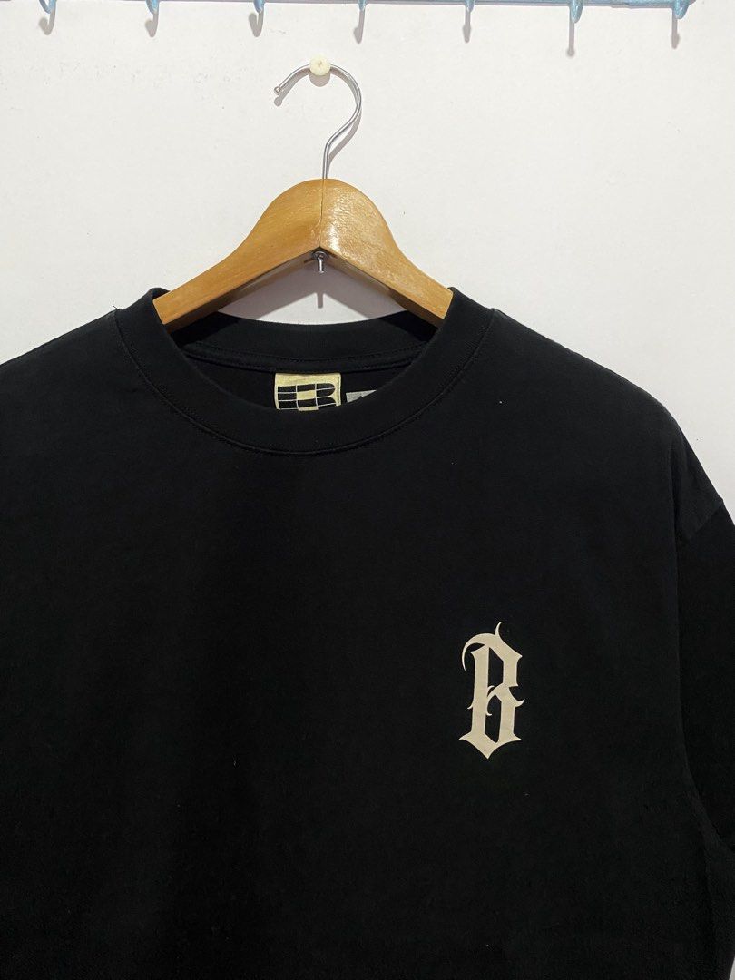 Boneless Black Graphic Tee (Category: Tshirts & Polo Shirts ) located in Jaen. Submitted by oshimamark58418 (Listing ID 1467553173, Image 3). Description: - Brand: Boneless - Color: Black - Size: S (Approx. 23" x 27" based on manual measurement) - Design: Small 'B' logo on chest; large 'B' graphic and 'Tasteless, pointless and fearless' text on the back - Condition: Clean fabric with solid, high-quality print.