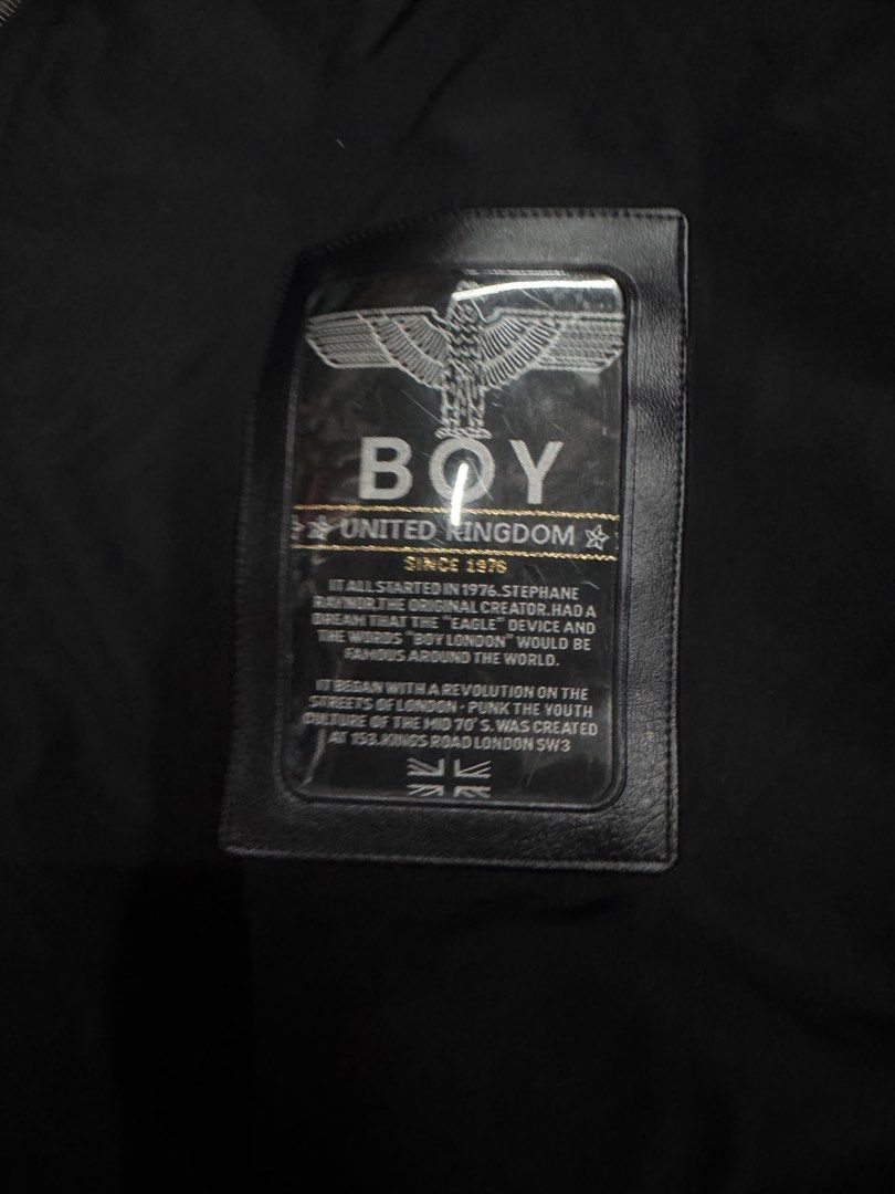 Boy London Long Bomber Jacket Black Size M (Category: Coats, Jackets and Outerwear) located in Bustos. Submitted by thenlnclot60500 (Listing ID 1467387564, Image 3). Description: - Brand: Boy London - Style: Long bomber jacket / Punk street style - Color: Black - Size: Medium - Details: Full zip front with custom pull, ribbed collar & cuffs - Accents: Graphic patch on chest, sleeve zip pocket with branded ribbon pull, large branded patch on back 