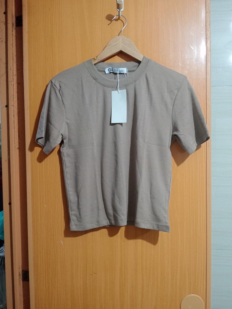 BRAND NEW Brown Shirt Top Stretch (Category: Shirts) located in Manila. Submitted by cenasells (Listing ID 1467570201, Image 1). Description: Brand new with Hang tag Size: Small Width : 17 inches ( relax measurements) Length : 20.5 inches Color : Brown Made in Bangladesh.