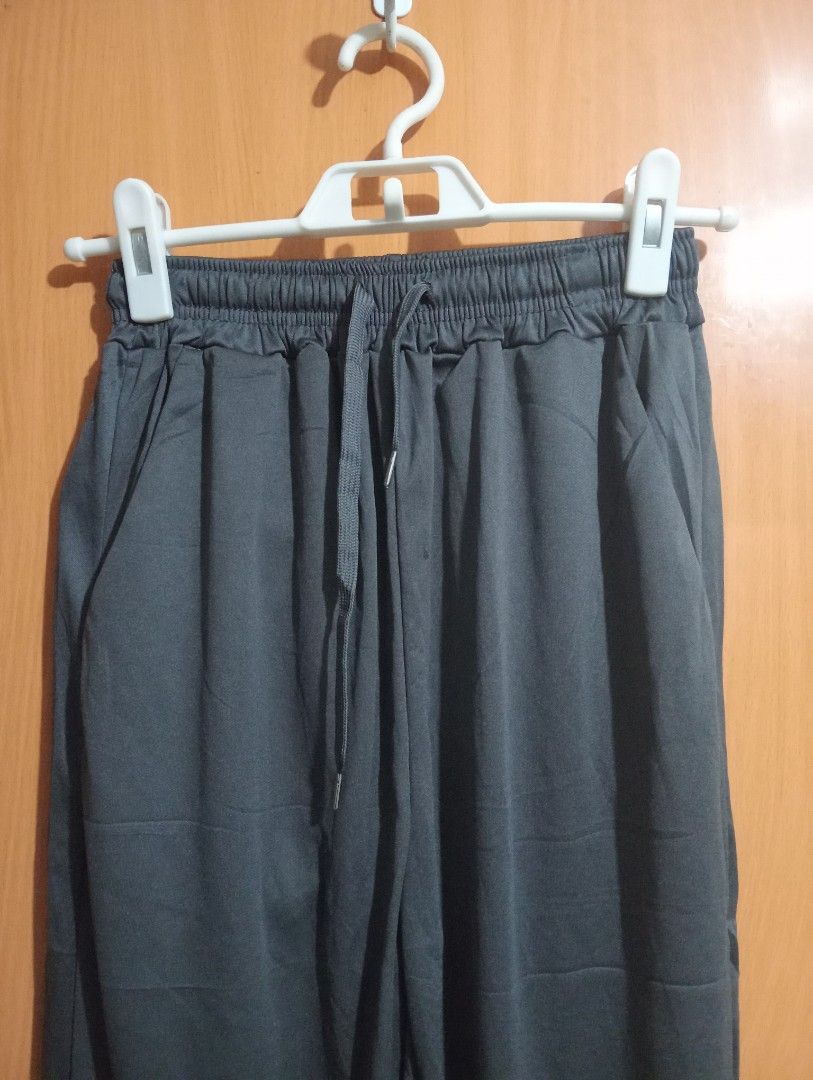 BRAND NEW Gray Drawstring Pants (Category: Other Bottoms) located in Manila. Submitted by cenasells (Listing ID 1467571105, Image 2). Description: Brand new Lightweight Pants Waist :20-28 inches Length :37 inches Fabric : Polyester Color : Dark Gray.