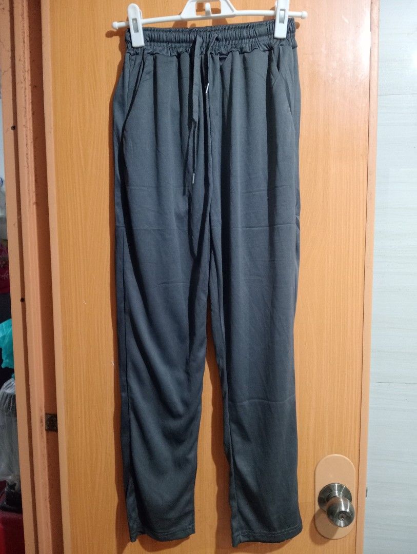 BRAND NEW Gray Drawstring Pants (Category: Other Bottoms) located in Manila. Submitted by cenasells (Listing ID 1467571105, Image 1). Description: Brand new Lightweight Pants Waist :20-28 inches Length :37 inches Fabric : Polyester Color : Dark Gray.