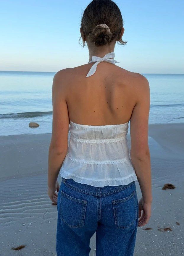 Brandy Melville Edith Halter Top (Category: Sleeveless) located in Manila. Submitted by c.mnl (Listing ID 1467401686, Image 2). Description: Bought in HK! Soft sheer cotton halter top featuring layered embroidered seams. Fabrics: 100% cotton Measurements: 19” (50cm) length, 13” (35cm) bust.