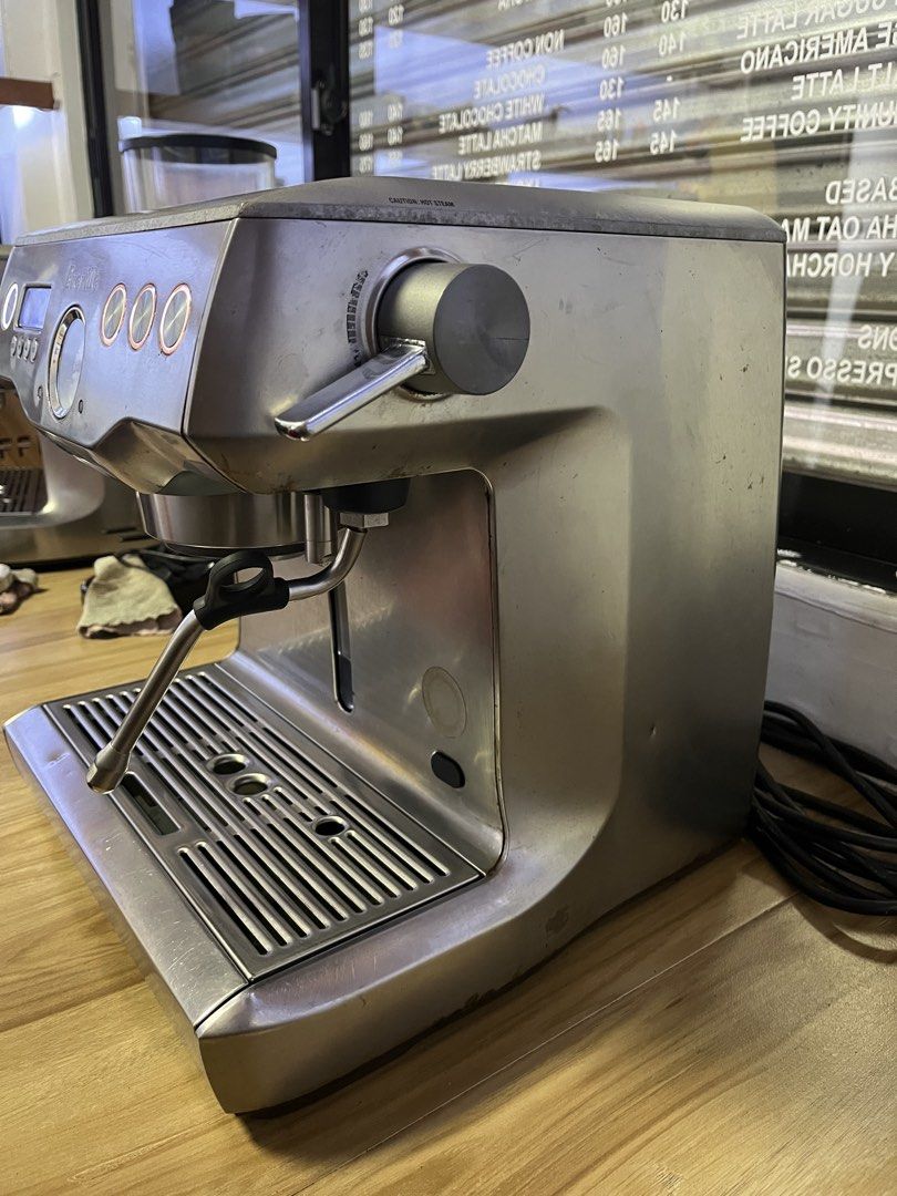 Breville Dual Boiler Espresso Machine (Category: Coffee Machines & Makers) located in Cainta. Submitted by saminjess (Listing ID 1467391450, Image 3). Description: Condition: Functioning well. Powers on and displays correctly, with visible smudges and water marks on the metal casing from normal use. Newly pms Included: machine, portafilter (with extra basket) Rfs: extra unit, used for events Delivery: Heavy unit, pickup preferred but shipping can