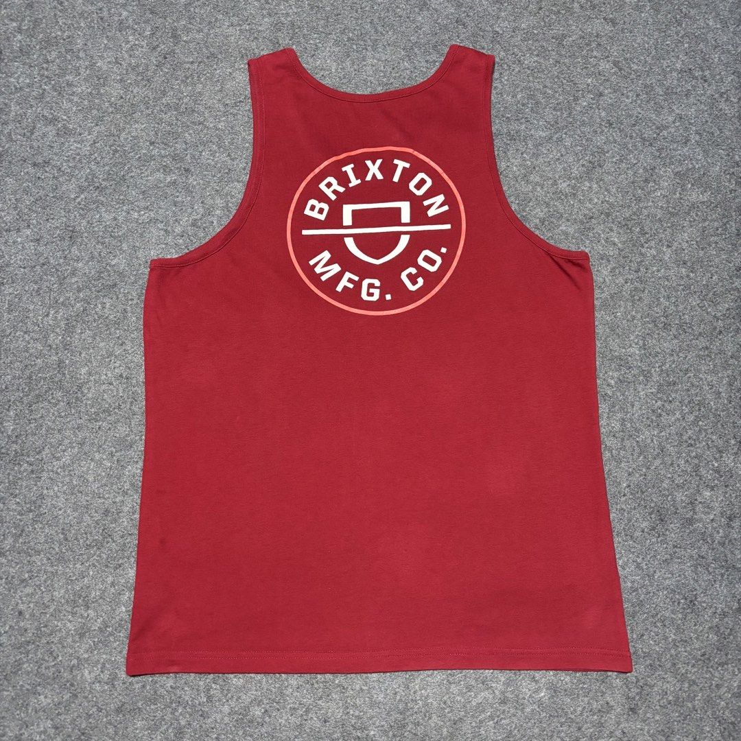 Brixton Red Tailored Fit Tank Top Size M (Category: Tshirts & Polo Shirts ) located in Cebu City. Submitted by andrewvivar29 (Listing ID 1467442439, Image 2). Description: - Brand: Brixton - Color: Rich Red - Size: Medium (Tailored fit) - Design: Small chest logo on front, large graphic on back - Style: Crew neck, sleeveless - Material: 60% Cotton, 40% Polyester (lightweight and comfortable) - Condition: Clean inside and out.