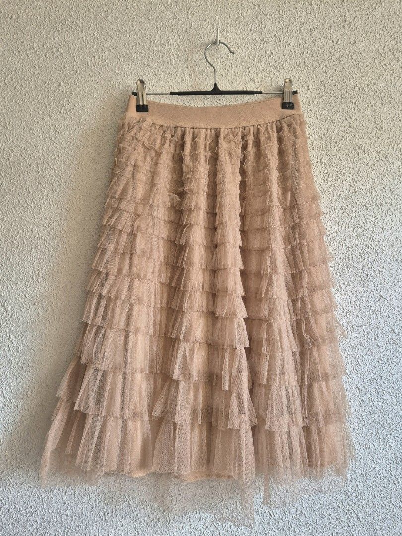 Brown Layered Tutu Skirt Ruffled Tulle (Category: Skirts) located in Manila. Submitted by belovedbyjess (Listing ID 1467408322, Image 2). Description: - Color: Brown - Design: Layered tutu with tiered ruffles and fluffy tulle fabric - Comfort: Stretchy elastic waistband - Coverage: Fully lined and not see-through - Versatility: Great for casual wear or dressing up.
