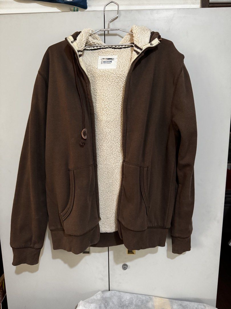Brown Sherpa Lined Zip-Up Hoodie Medium (Category: Coats, Jackets and Outerwear) located in Quezon City. Submitted by by.previouslyowned (Listing ID 1467379651, Image 1). Description: Winter hoodie. Never used it, kept it in the storage for a very long time. Price is negotiable .