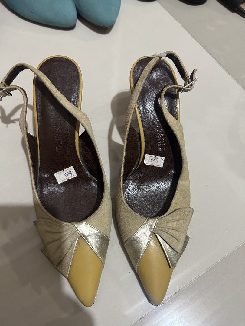 Bruno magli sling back size 33 (Category: Heels) located in Cavite. Submitted by cecitrifthshop (Listing ID 1467412758, Image 1). Description: a pair of vintage beige and gold leather slingback pumps by Bruno Magli, featuring a pointed toe with gold metallic trim and an ankle strap.made in italy .
