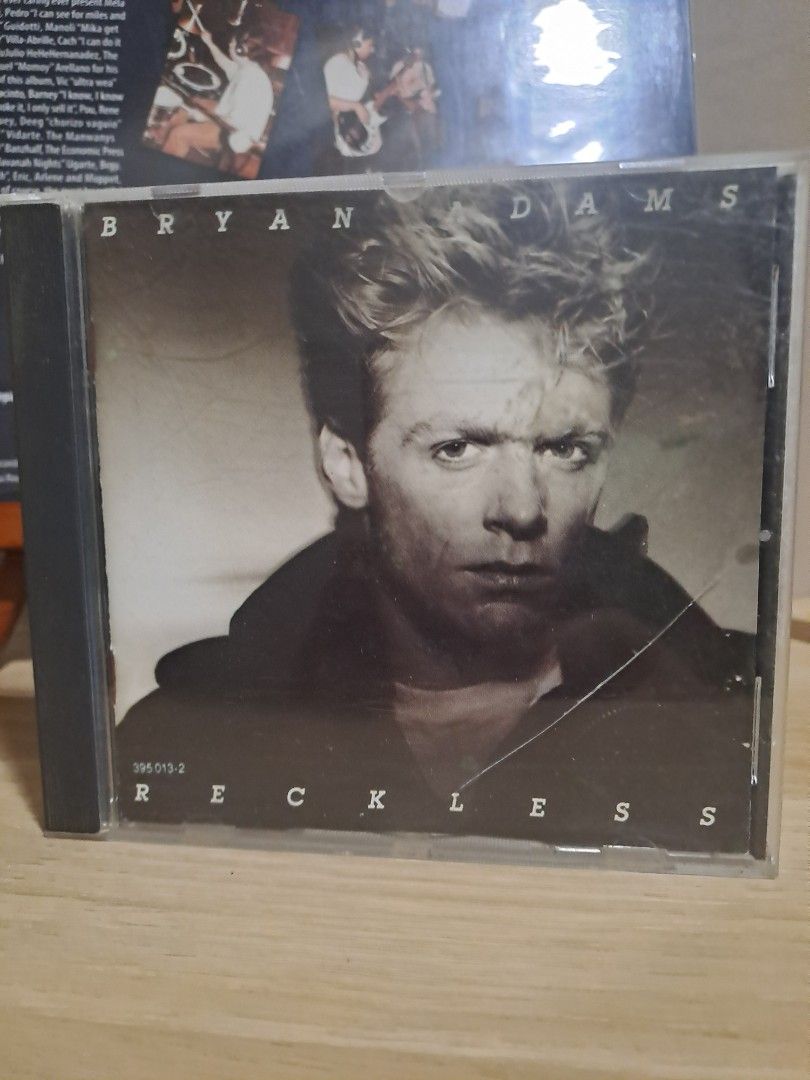 Bryan Adams Reckless CD Album (Category: CDs & DVDs) located in Las Pinas. Submitted by cobieshop (Listing ID 1467492584, Image 1). Description: - Artist & Album: Bryan Adams - Reckless - Format: Audio CD with original jewel case and front cover art insert - Key Tracks: Includes massive 80s hits like "Run to You" and "Summer of '69" - Condition: Clear plastic case shows minor shelf wear, disc plays great - Genre: Essential classic rock staple.