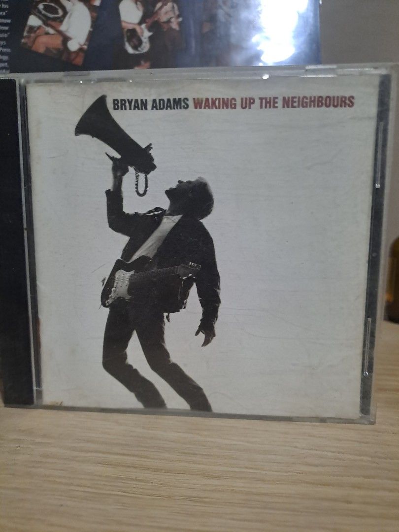 Bryan Adams Waking Up The Neighbours Audio CD (Category: CDs & DVDs) located in Las Pinas. Submitted by cobieshop (Listing ID 1467493144, Image 1). Description: - Artist & Album: Bryan Adams - Waking Up The Neighbours (1991 Classic Rock) - Key Track: Includes the massive hit '(Everything I Do) I Do It for You' - Condition: Disc plays fine; standard jewel case has normal surface scratches from storage - Inclusion: Original artwork insert included 