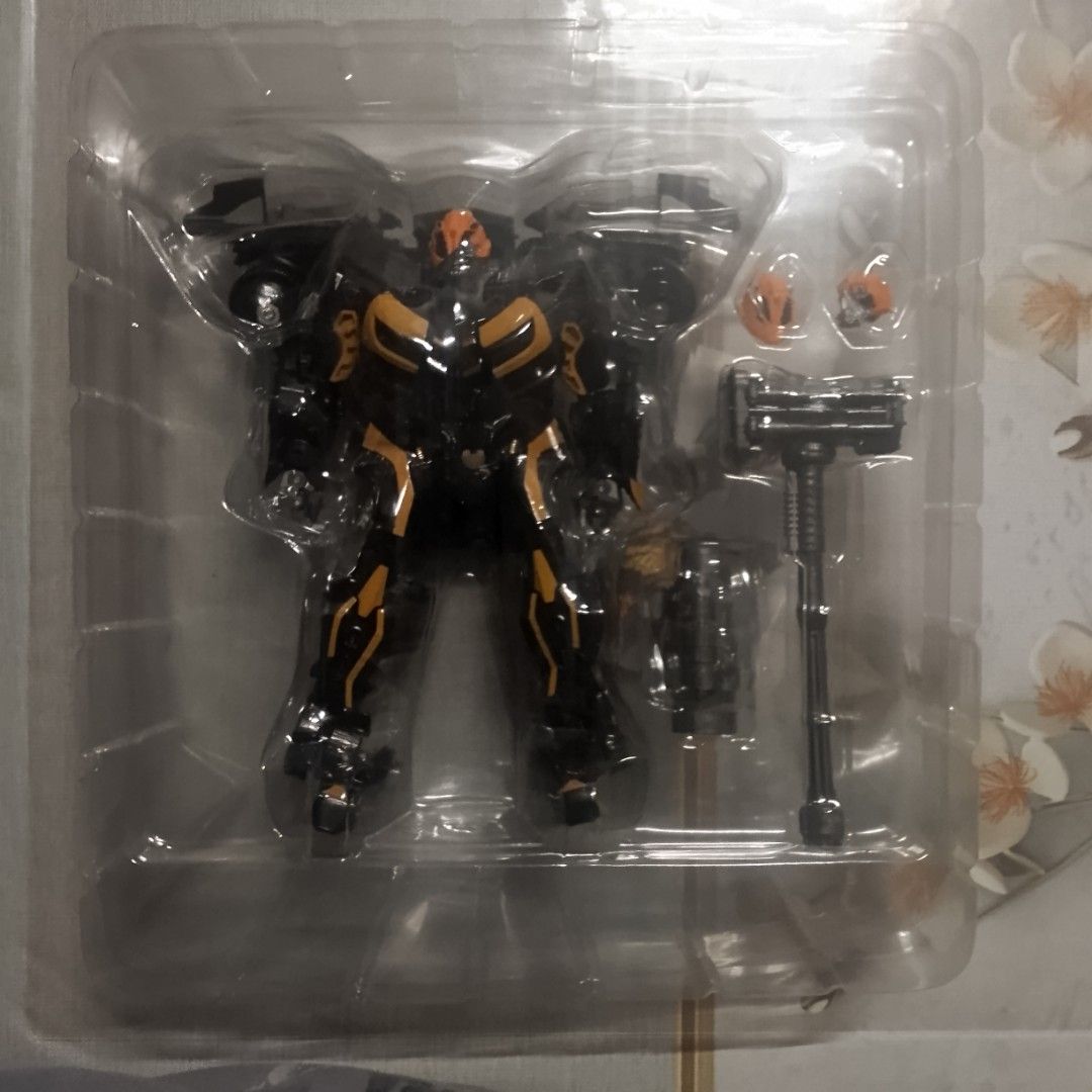 Bumblebee Collectible (Category: Figurines & Statues) located in San Jose del Monte. Submitted by cpl05 (Listing ID 1467529049, Image 3). Description: - Brand: Baiwei Tengwei - Model/Title: The Wasp Warrior (Bumblebee collectible) - Condition: Good condition, no damage or minor scratches. All of the parts are complete It can both be turned into its robot form or the car form. Good for display or gift for a child or person who likes robots .