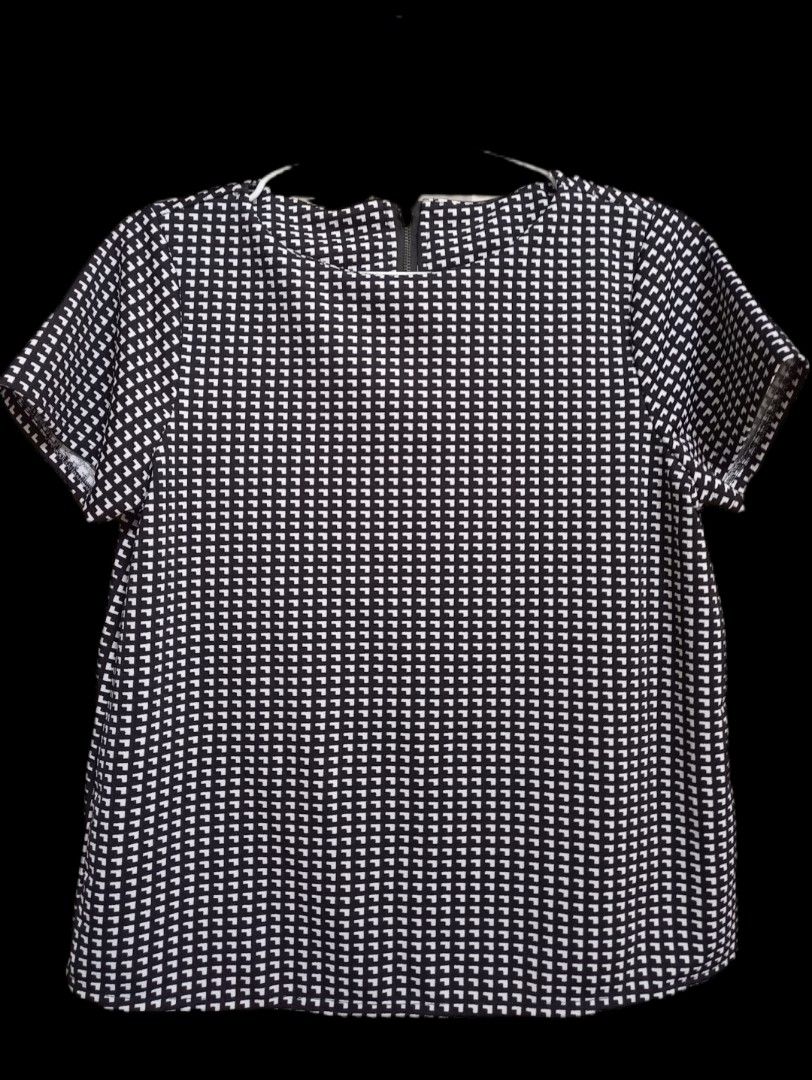 BUNDLE Korean Pattern Top (Category: Blouses) located in General Santos City (Dadiangas). Submitted by silvkimber62755 (Listing ID 1467433908, Image 2). Description: - Bundle of 2 trendy short-sleeve tops - Top 1: Solid white textured tee, made in Korea, round neckline with side slits - Top 2: Black and white geometric pixel pattern with a convenient back zipper closure - Fit: Regular fit, flattering and comfortable - Styling: Super easy to match