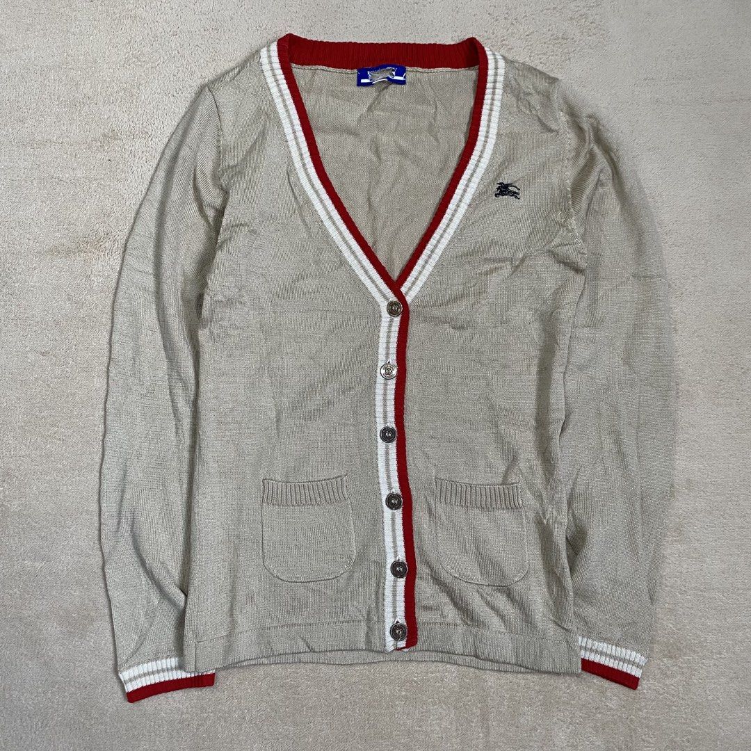 Burberry Blue Label Knit Cardigan (Category: Longsleeves) located in Polomolok. Submitted by larnel27 (Listing ID 1467527331, Image 1). Description: - Size xs - Dimension:14x22 - Color rate 9.8 - Authentic, napunit lang necktag.