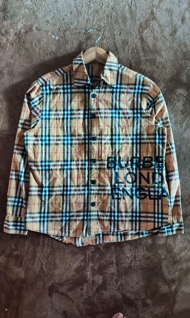 Burberry Bottondown (Category: Luxury Apparel) located in Manila. Submitted by mackussil (Listing ID 1467386176, Image 1). Description: Burberry button down size Medium Dimes 21x25'26 complete tags no issue.