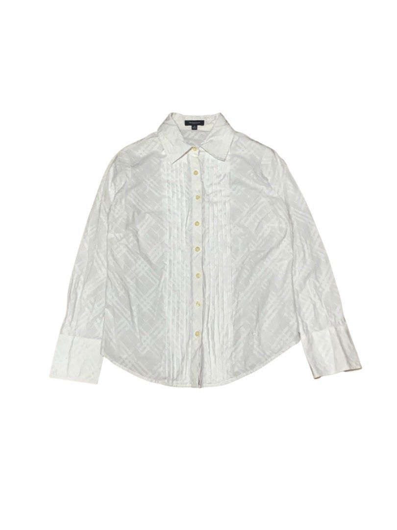 Burberry Plaid (Category: Longsleeves) located in Manila. Submitted by lyf_7hrift (Listing ID 1467509423, Image 1). Description: Burberry Plaid Longsleeve P250 23L 17W Dimes 9.5/10 Color Rate Excellent Condition.