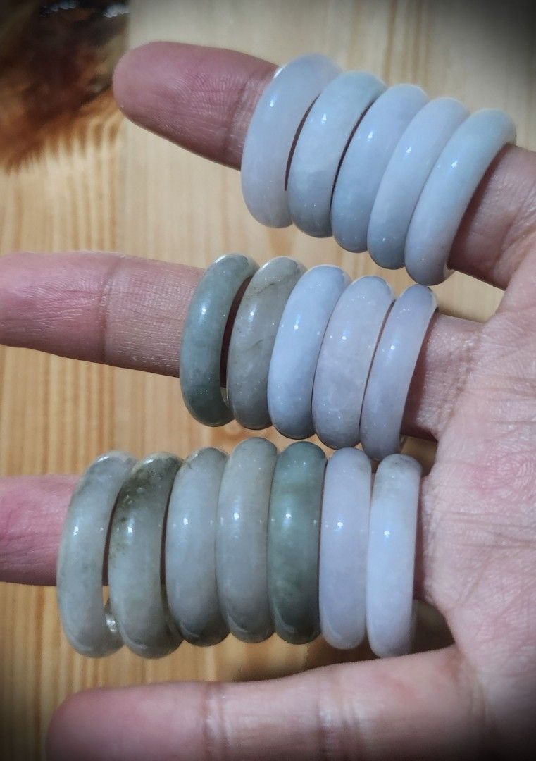 Burmese Jadeite Bangle Rings (Category: Rings) located in Baguio. Submitted by lausgem2026 (Listing ID 1467443308, Image 3). Description: -Burmese Jadeite Bangle Rings with colors ranging from white, light yellow, and light green. -First Row (Index Finger): 18mm+ diameter sizes -Second Row (Middle Finger): 19mm+ diameter sizes -Third Row (Ring Finger): 20mm+ diameter sizes (DM to check for color and size availability) Note: 180PHP/pc 300PHP/2 pcs