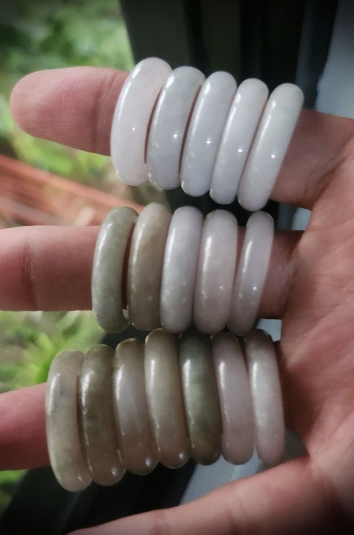 Burmese Jadeite Bangle Rings (Category: Rings) located in Baguio. Submitted by lausgem2026 (Listing ID 1467443308, Image 1). Description: -Burmese Jadeite Bangle Rings with colors ranging from white, light yellow, and light green. -First Row (Index Finger): 18mm+ diameter sizes -Second Row (Middle Finger): 19mm+ diameter sizes -Third Row (Ring Finger): 20mm+ diameter sizes (DM to check for color and size availability) Note: 180PHP/pc 300PHP/2 pcs