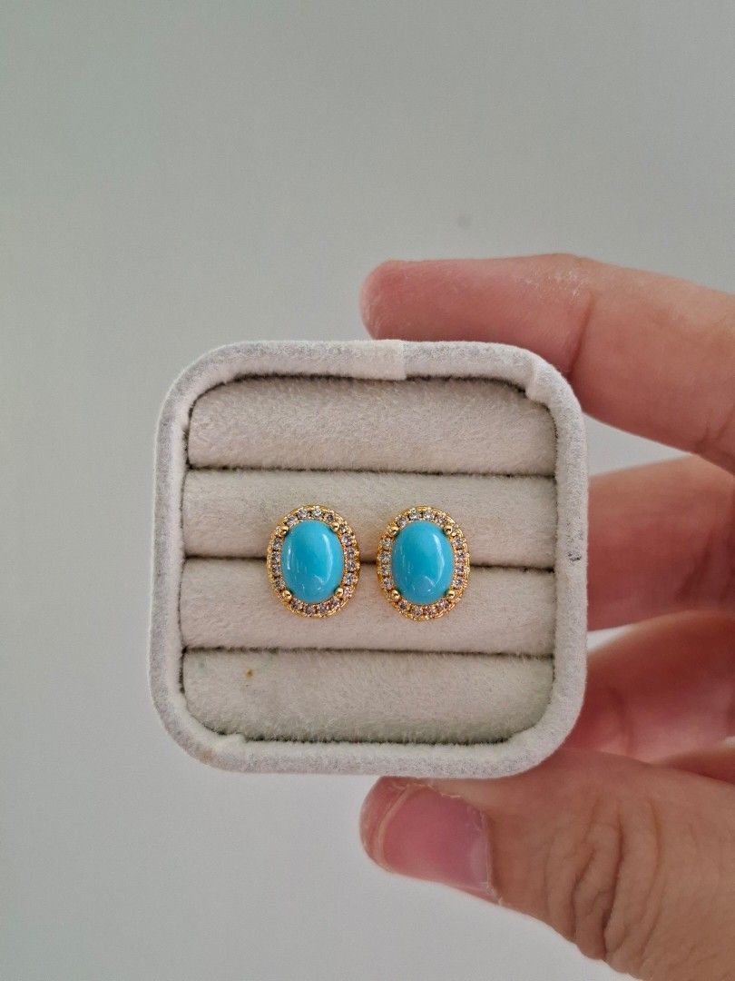 Cabochon Type Oval Turquoise Stone Gold Stud Earrings (Category: Earrings) located in Dasmarinas. Submitted by danabrie22 (Listing ID 1467437110, Image 1). Description: very well-made, excellent crafstmanship 10/10 condition brand new stainless steel & colored cubic zirconia stones made in Hongkong.