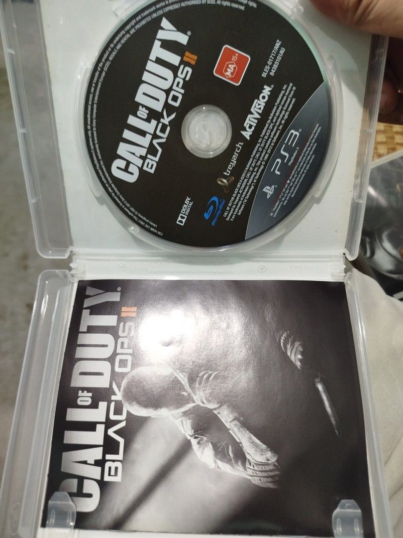 Call of Duty Black Ops 2 PS3 Game (Category: PlayStation) located in Subic. Submitted by regiedaniel01 (Listing ID 1467535096, Image 3). Description: - Title: Call of Duty Black Ops II - Platform: PlayStation 3 (PS3) - Region: PAL format - Rating: MA 15+ (Strong violence & coarse language) - Included: Original case, game disc, and manual booklet - Condition: Clean disc surface, case closes properly with no cracks - Ideal for: Collectors and FPS f