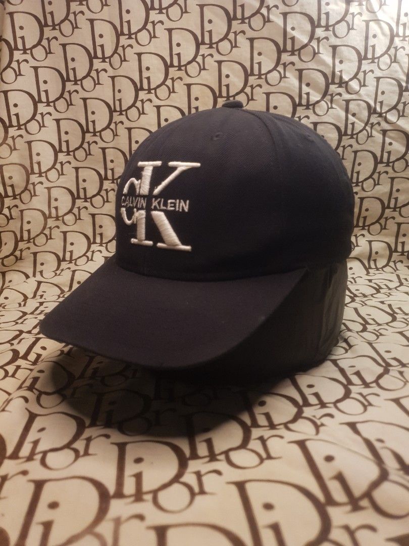 Calvin Klein snapback cap hat (Category: Caps & Hats) located in San Fernando. Submitted by retro.district. (Listing ID 1467516897, Image 2). Description: - Calvin Klein snapback cap - Size: Adjustable - Condition: Fair - issue: top button, male snap.