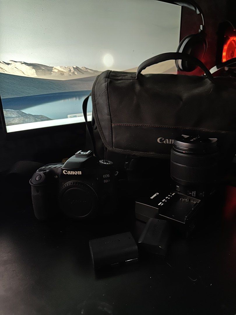 Canon EOS 80D DSLR Camera Bundle with Lens and Bag (Category: Cameras) located in Manila. Submitted by jerdsilog (Listing ID 1467475711, Image 1). Description: - Canon EOS 80D DSLR camera body with zoom lens - 18-135mm kit lens - Complete bundle: includes 2 batteries, dedicated charger, and original black Canon camera bag - Condition: Powers up normally with intact rubber grips around body and ports - Versatile setup: Ideal for both photography a