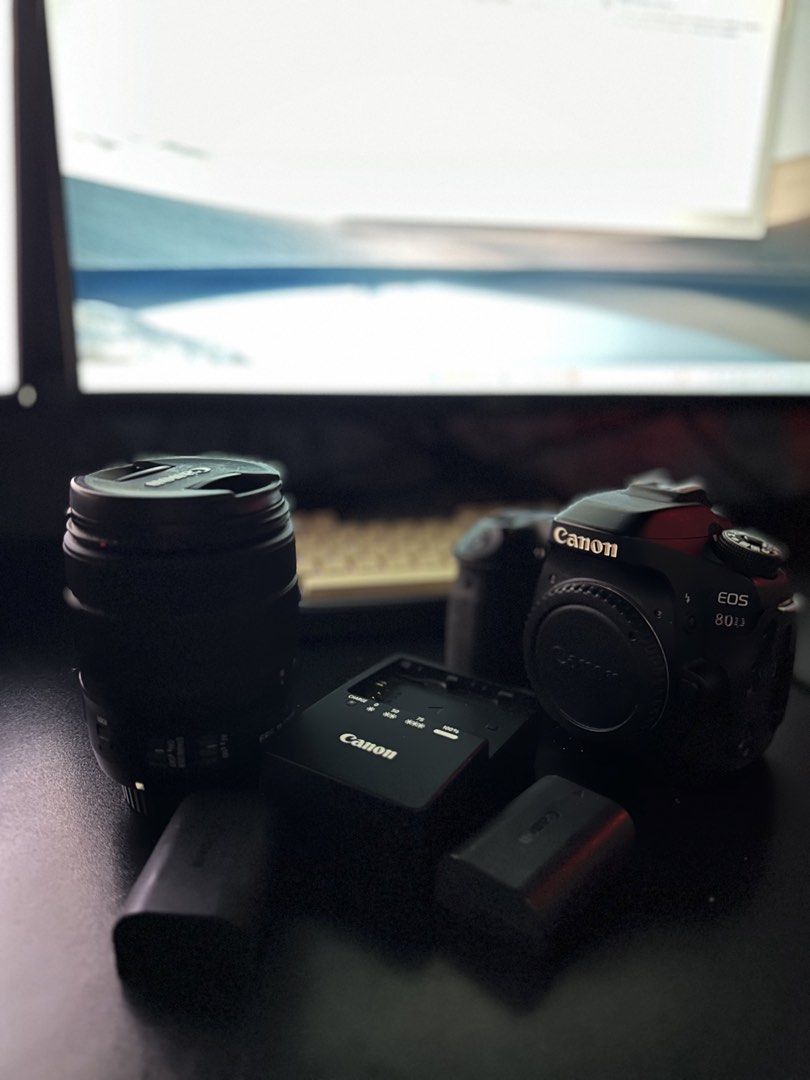 Canon EOS 80D DSLR Camera Bundle with Lens and Bag (Category: Cameras) located in Manila. Submitted by jerdsilog (Listing ID 1467475711, Image 2). Description: - Canon EOS 80D DSLR camera body with zoom lens - 18-135mm kit lens - Complete bundle: includes 2 batteries, dedicated charger, and original black Canon camera bag - Condition: Powers up normally with intact rubber grips around body and ports - Versatile setup: Ideal for both photography a