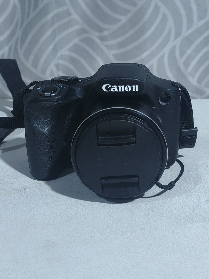 Canon PowerShot SX530 HS Digital Camera (Category: Cameras) located in Quezon City. Submitted by boldearth_27b1b3 (Listing ID 1467582544, Image 1). Description: - Model: Canon PowerShot SX530 HS Digital Camera (Black) - Zoom: Powerful 50x optical zoom, ideal for travel, sports, and wildlife - Connectivity: Built-in Wi-Fi for easy photo sharing - Condition: Fully functional, powers on properly, shows minor surface wear from normal handling - Inclu