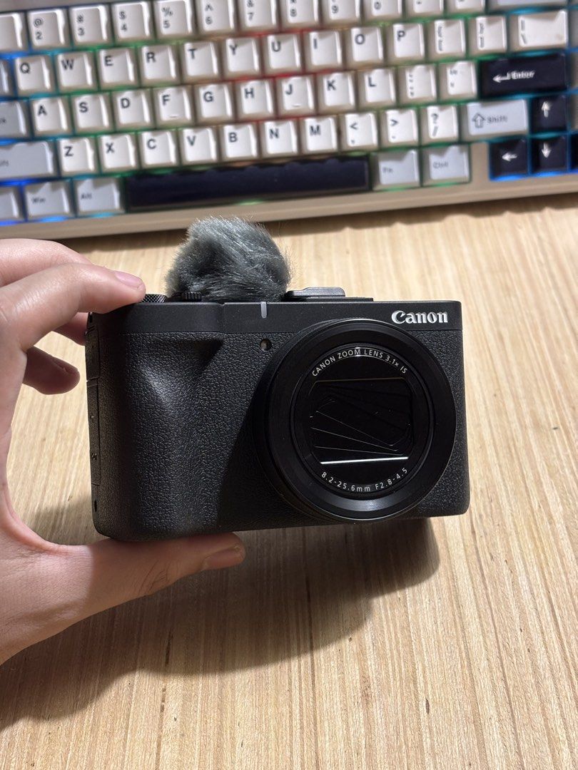 Canon Powershot V1 with AD-E1 adapter (Category: Cameras) located in San Juan City. Submitted by velardedrew (Listing ID 1467392599, Image 1). Description: Canon Power Shot V1 with Canon AD - E1 bundled for sale! Camera is relatively brand new and only a couple months old. All mechanical and functional features are flawless and working. Great entry level vlogging camera, and a nice alternative to the famous G7X. The flip screen is also convenient