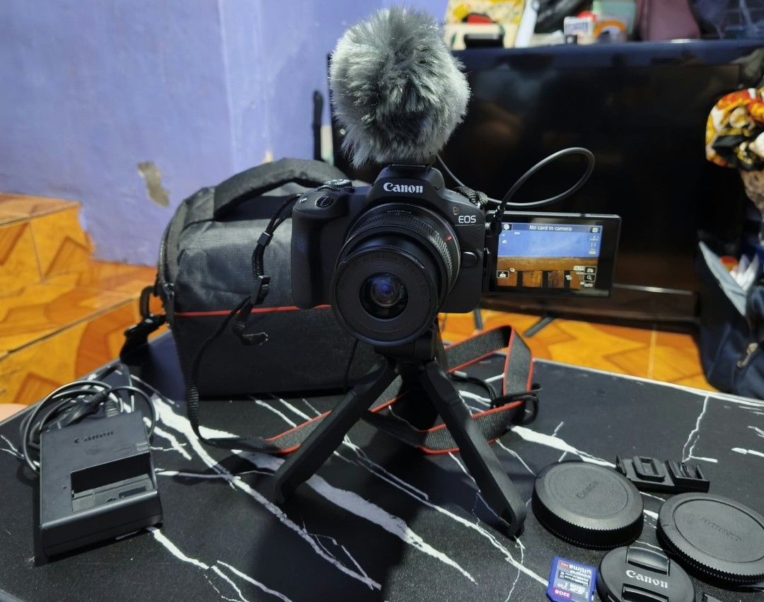 Canon R50 mirror less (Category: Cameras) located in Manila. Submitted by akims_08 (Listing ID 1467572681, Image 1). Description: Canon EOS R50 Vlogging Kit Specifications: * 24.2MP APS-C CMOS Sensor * DIGIC X Image Processor * UHD 4K 30p Video Recording * Dual Pixel CMOS AF II with 651 AF Points * 2.36M-Dot Electronic Viewfinder * 3.0"1.62M-Dot Vari-Angle Touchscreen * Up to 15 fps Electronic Shutter * Movie for Close-Up Demos Mode * Vertical Mo