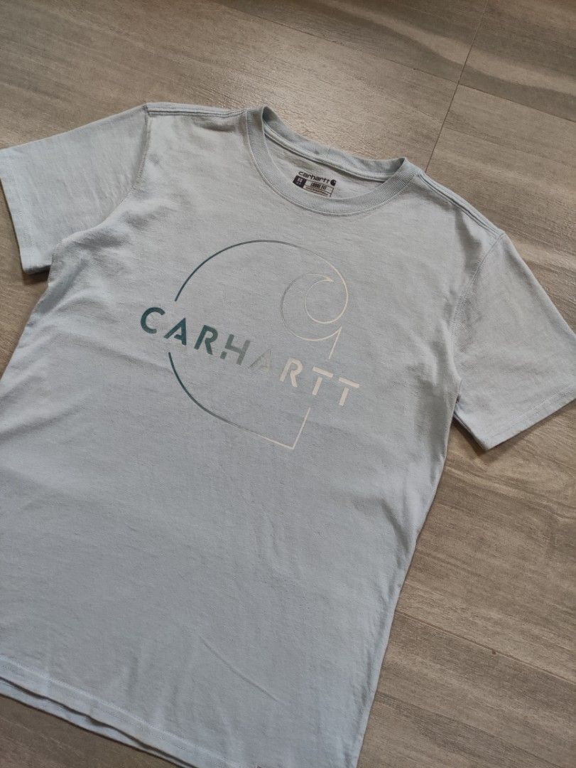 Carhartt Modern Logo Graphic Tee (Category: Tshirts & Polo Shirts ) located in Calamba. Submitted by alorbis96758 (Listing ID 1467462172, Image 2). Description: Chest Width : 18" Length : 26" Best Fit : XS Men / S Women Color Rate : 9.5 Flaws : Cut Tag.