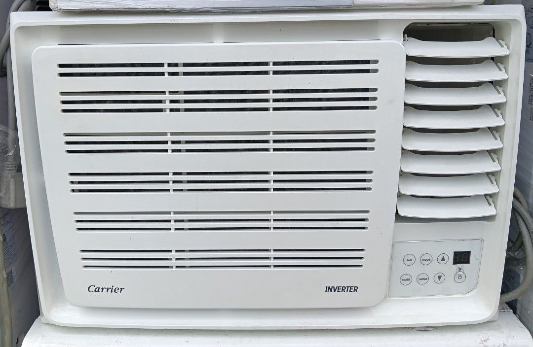 Carrier Inverter Window Type Air Conditioner (Category: Air Conditioning and Heating) located in Manila. Submitted by jamaya09 (Listing ID 1467494745, Image 1). Description: - Brand: Carrier Window Type Aircon - Technology: Energy-saving Inverter - Color & Design: Clean white finish with digital display and touch controls - Airflow: Adjustable side louvers - Functions: Fan, Mode, Timer, and Swing - Installation: Standard rectangular housing for w