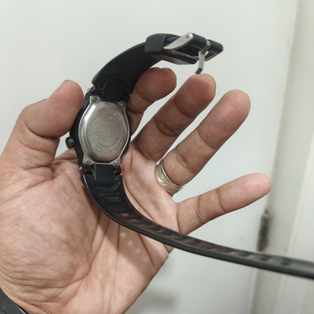 Casio G-Shock DW-290 Digital Watch (Category: Women's Watches) located in Manila. Submitted by narju1234 (Listing ID 1467369713, Image 2). Description: - Brand/Model: Casio G-Shock DW-290 - Features: Shock resist construction, 20 bar water resistance, 10-year battery life, and distinct green digital display - Materials: Black resin strap and stainless steel back case - Condition: Used daily with minor scratches on the back plate and some dust bui