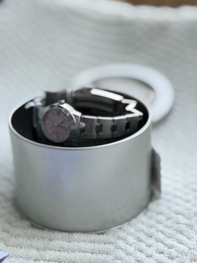 Casio LTP-1241D-4ADF Quartz Pink Dial Watch (Category: Women's Watches) located in Manila. Submitted by rusnoyell42981 (Listing ID 1467432465, Image 2). Description: - Brand: Casio Quartz Watch - Condition: Brand new, never worn, with protective films still on the bezel, clasp, and caseback - Design: Stunning pink dial paired with a sleek stainless steel bracelet and water-resistant build - Inclusions: Complete set with original metal tin case, w
