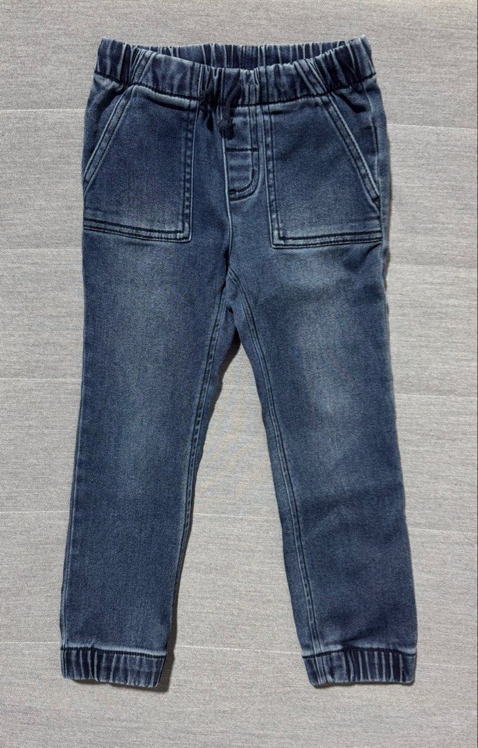 Cat & Jack Denim Jogger Pants Elastic Waist (Category: Babies & Kids Fashion) located in Rizal. Submitted by preloovved (Listing ID 1467498455, Image 1). Description: Super comfy dark wash denim joggers for kids! Features an easy elastic drawstring waist, stylish ribbed cuffs, and handy pockets. Soft faded finish for that cool, casual everyday look. Preloved, 4yo Meet-up only in GB1 San Mateo, Rizal Shipping fee c/o buyer. Tres Marias or J&T expr