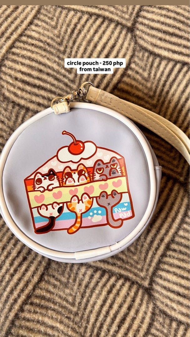 Cat Circle Pouch / Coin Purse with Strap (Category: Purses & Pouches) located in Batangas. Submitted by han.jpg (Listing ID 1467485265, Image 2). Description: - bought in Taiwan - art by paw_pad - onhand, ready to ship - pay as you mine - MOP: gcash, maribank - MOD: J&T (54 sf within luzon) - location: batangas.