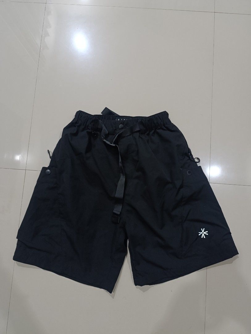 Catalog Utility Shorts (Category: Shorts) located in Davao. Submitted by idioticthrifter (Listing ID 1467543454, Image 1). Description: - Brand/Model: Catalog Black Cargo Shorts - Size: L (fits 180/84A) - Material: 100% polyester shell and lining with breathable mesh inside - Fit & Comfort: Elastic waistband with adjustable built-in belt - Details: Multiple side pockets, button accents, and small white logo on the left leg - Style: Ultimate stree