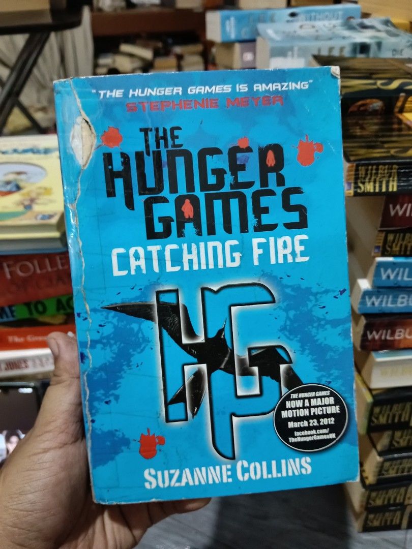 Catching Fire; Hunger Games( Paperback/Hardcover) (Category: Storybooks) located in Luna. Submitted by bookmine (Listing ID 1467571755, Image 3). Description: Paperback w/ flaw( Cuts on Cover)-150 hardcover -550 hardcover no dustcover-399.