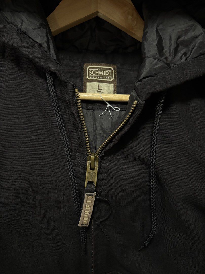 C.E. Schmidt Workwear Black Hooded Canvas Jacket Size L Tall (Category: Coats, Jackets and Outerwear) located in Paranaque City. Submitted by arcvintage (Listing ID 1467461754, Image 3). Description: Size: Large tall Chest: 26.5” Length: 29” Flaws: Color rate: 9.5/10 ₱1000 plus shipping fee. ________________________________________ Sizing is determined by measurements not by the garment tag. ________________________________________ Disclaimer: Ar