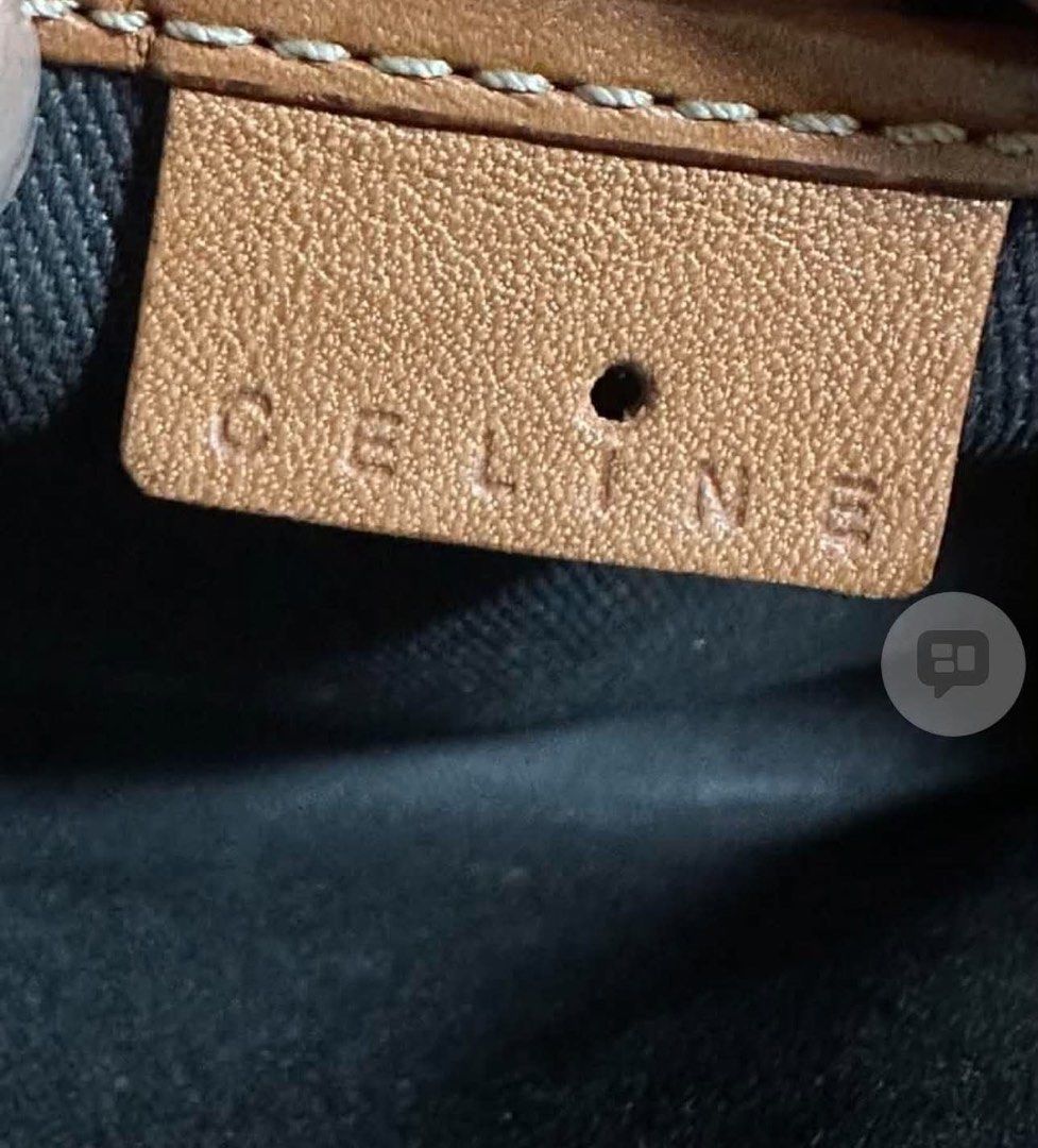 Celine Macadam Brown Monogram Clutch Bag (Category: Luxury Bags & Wallets) located in Dipolog. Submitted by adrian281994 (Listing ID 1467388188, Image 3). Description: - Brand: Celine - Material: Brown Macadam monogram coated canvas with tan leather trim - Closure: Zip top - Features: Removable wrist strap, dark fabric interior lining, and interior slip pocket - Origin: Made in Italy, stamped leather tag with serial code CE00/13 - Condition: Visi
