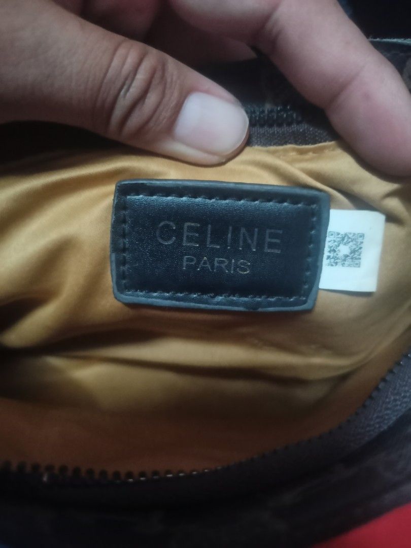 Celine Triomphe Canvas Shoulder Bag Brown (Category: Luxury Bags & Wallets) located in Cavite. Submitted by ronniel0943882 (Listing ID 1467391106, Image 3). Description: Celine shoulder bag with iconic Triomphe monogram print - Brown canvas body paired with elegant tan leather strap - Secure top zipper closure with a stylish gold-tone front flap clasp - Vibrant yellow fabric lining featuring an interior logo patch and tag - Compact size, perfect 