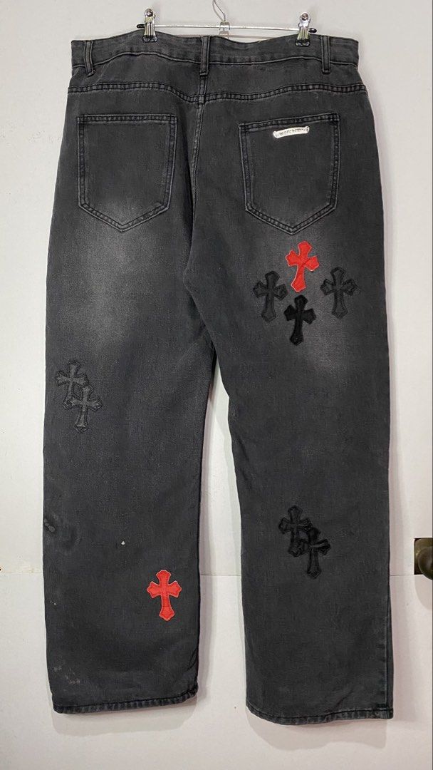 CH PANTS (Category: Jeans) located in Jaen. Submitted by oshimamark58418 (Listing ID 1467450765, Image 2). Description: - Brand: Chrome Hearts style (CH) - Color: Washed black - Size: XL (Waist 36) - Design: Statement denim pants featuring contrasting cross patches in black, white, and red - Fit: Comfortable straight or relaxed fit for everyday streetwear - Condition: Pre-loved, well-maintained, great overall quality.