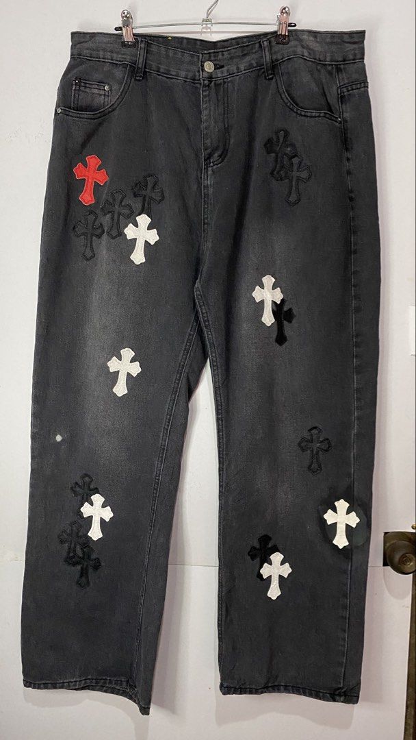 CH PANTS (Category: Jeans) located in Jaen. Submitted by oshimamark58418 (Listing ID 1467450765, Image 1). Description: - Brand: Chrome Hearts style (CH) - Color: Washed black - Size: XL (Waist 36) - Design: Statement denim pants featuring contrasting cross patches in black, white, and red - Fit: Comfortable straight or relaxed fit for everyday streetwear - Condition: Pre-loved, well-maintained, great overall quality.
