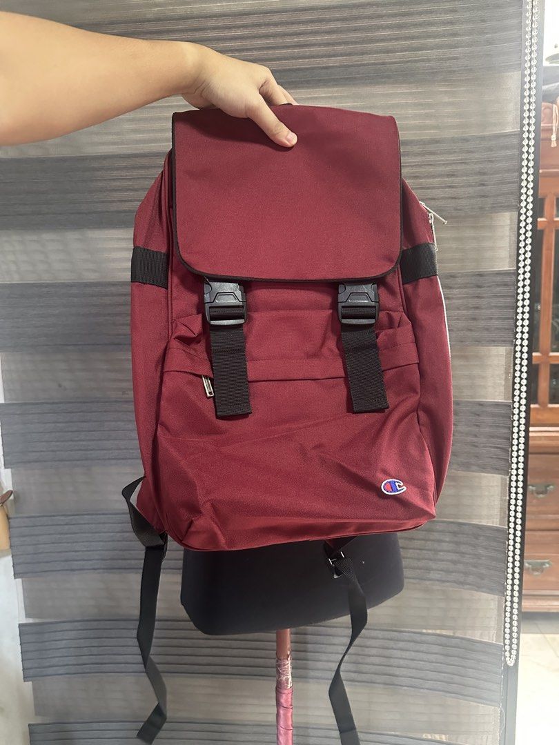 Champion Maroon Flap Backpack with Buckle Straps (Category: Backpacks) located in Quezon City. Submitted by prelovedbagsbygiv (Listing ID 1467462604, Image 1). Description: .