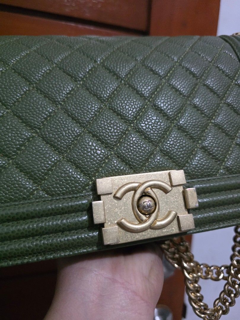 Chanel Boy Bag Green Caviar Gold Hardware (Category: Luxury Bags & Wallets) located in Lemery. Submitted by venus23 (Listing ID 1467583016, Image 2). Description: - Chanel Boy bag - Rare olive green caviar leather with structured quilted body - Antique gold-tone hardware and CC push-lock closure - Chunky gold chain strap with comfortable leather shoulder guard - Clean deep green interior lining -shipping via J&T at buyer's expense.