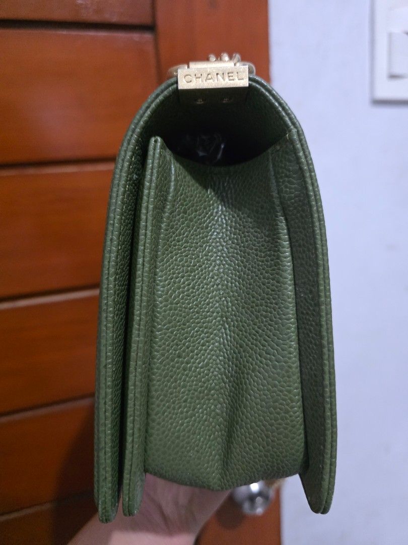 Chanel Boy Bag Green Caviar Gold Hardware (Category: Luxury Bags & Wallets) located in Lemery. Submitted by venus23 (Listing ID 1467583016, Image 3). Description: - Chanel Boy bag - Rare olive green caviar leather with structured quilted body - Antique gold-tone hardware and CC push-lock closure - Chunky gold chain strap with comfortable leather shoulder guard - Clean deep green interior lining -shipping via J&T at buyer's expense.