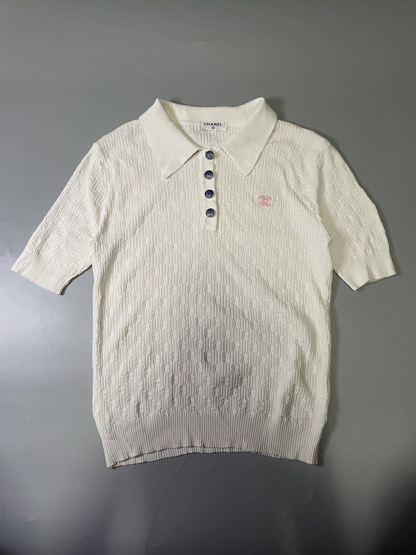 Chanel Knitted polo shirt (Category: Luxury Apparel) located in Bocaue. Submitted by mosthighcollective (Listing ID 1467384328, Image 1). Description: Chanel Knitted polo shirt Size: 36 on tag (S to M) Dimes: 17.5 width 22.5 length Good as new condition No issue 2500 only Dm me to purchase 📥.