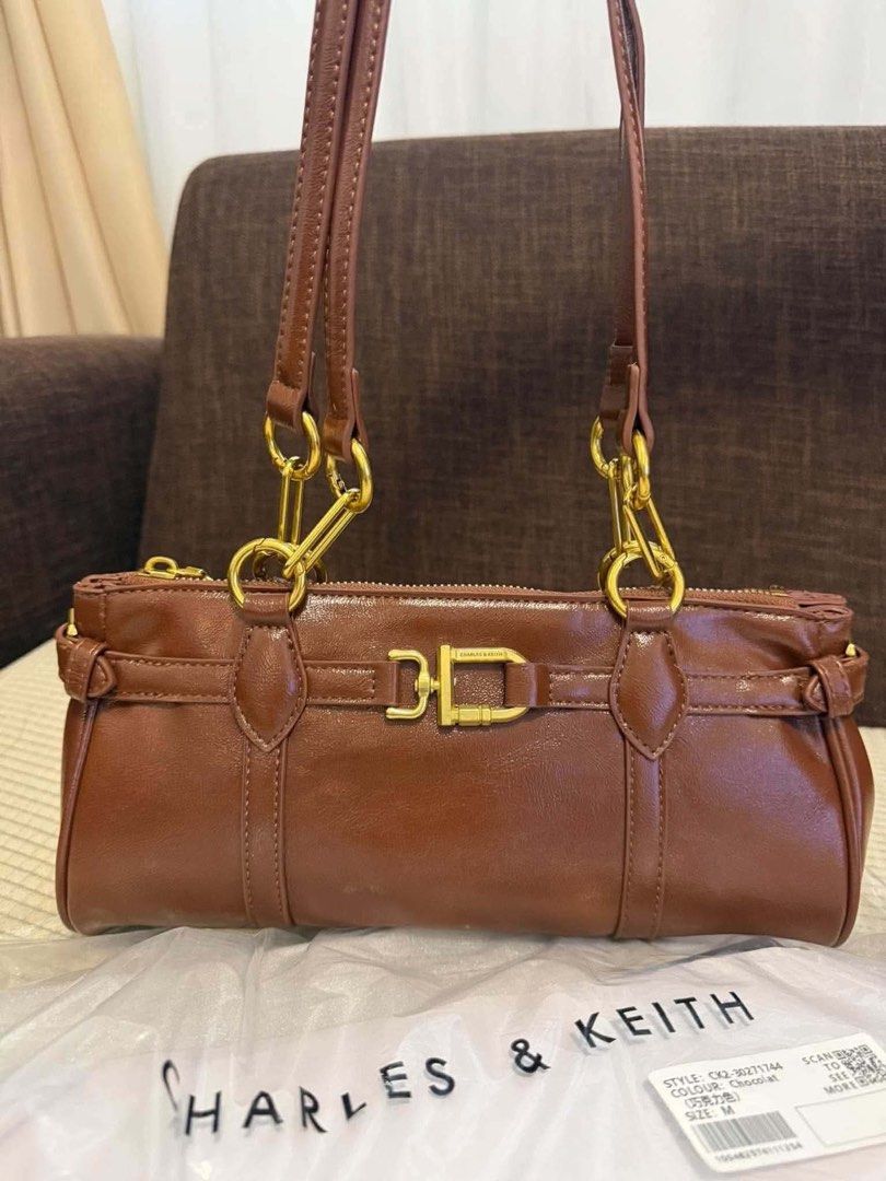 Charles & Keith Gwynne Metallic Shoulder Bag (Category: Shoulder Bags) located in Taguig. Submitted by renzms (Listing ID 1467495398, Image 2). Description: • fresh from 🇻🇳 • with eco bag & paper bag • on hand & ready to ship • actual photos | what you see is what you exactly get! • shipping nationwide via tiktok co.