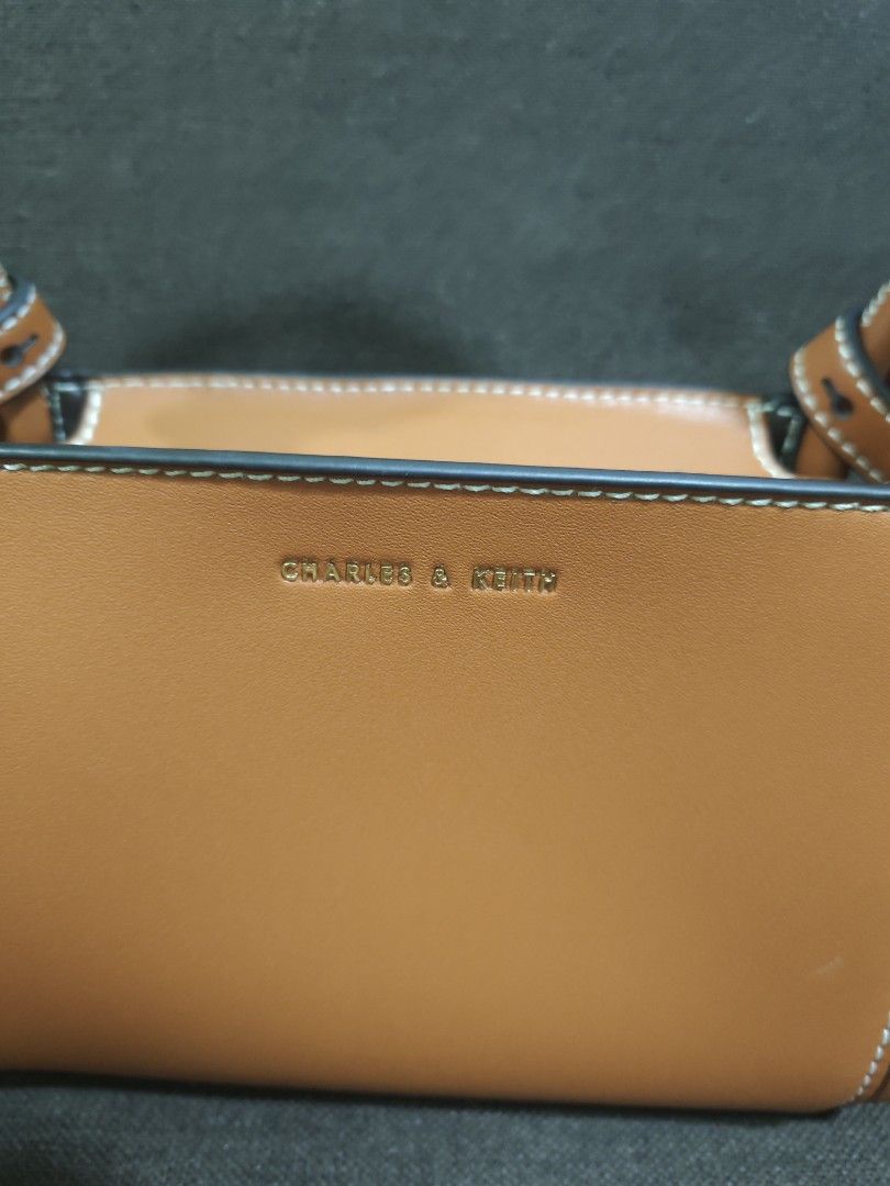 Charles & Keith mini hand/sling bag (Category: Cross-body Bags) located in Pili. Submitted by zaneombao03491 (Listing ID 1467373291, Image 2). Description: .