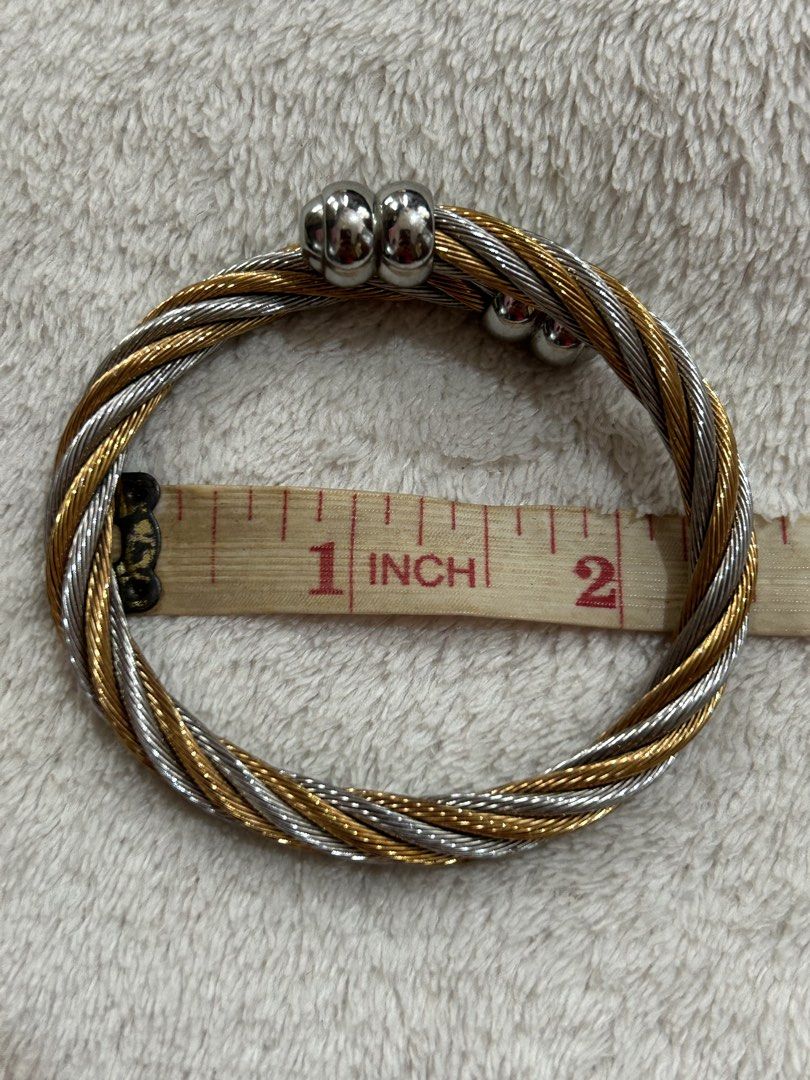Charriol Bangle (Category: Bracelets) located in Baguio. Submitted by previouslymine.10 (Listing ID 1467427486, Image 3). Description: - Authentic Charriol Geneve Bangle - 2-tone cable design - With original box - With authenticity card - Reference no: 04-91-171S.