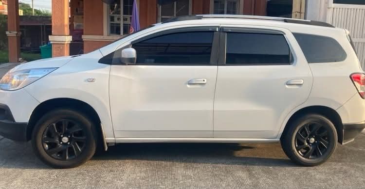 Chevrolet Spark spinchevywhite Auto (Category: Used Cars) located in Quezon City. Submitted by charchartindahan (Listing ID 1467383803, Image 3). Description: Chevrolet October 2014 Spin Chevy White Gas A/T 1.5 LTZ 6speed mileage - 167,700 Upgraded Good condition Reason of selling - buying new car Asking price - 300k negotiable.