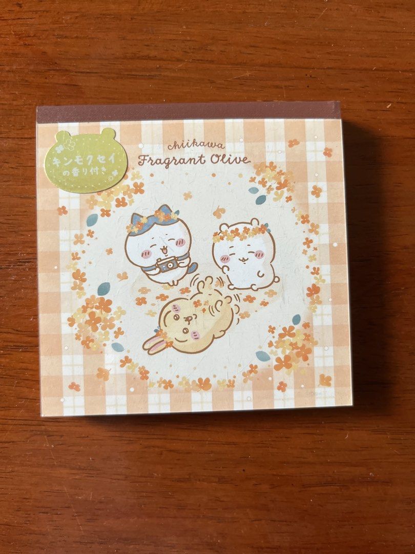 Chiikawa Fragrant Olive Square Memo Pad Sun-Star (Category: Stationery & School Supplies) located in Malolos. Submitted by mavi.annxo (Listing ID 1467388581, Image 1). Description: - Authentic Chiikawa Fragrant Olive collection square memo pad - Features a subtle osmanthus scent when you rub the flowers on the cover - Made in Japan by Sun-Star - Contains 100 sheets total, split across 4 adorable designs (25 sheets per design).